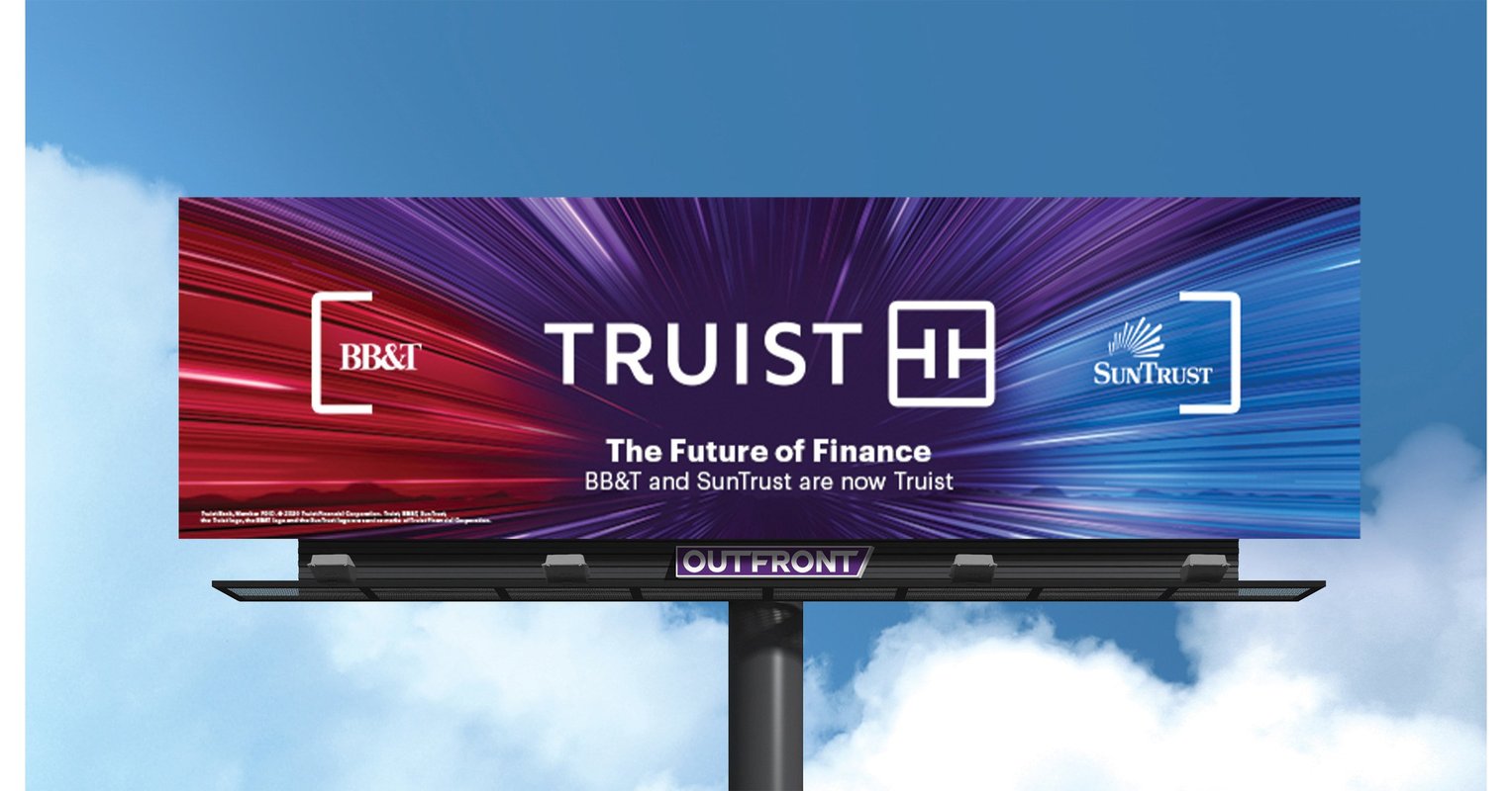 This image represents a billboard with a brightly coloured background and the corporate logo engraved on it.