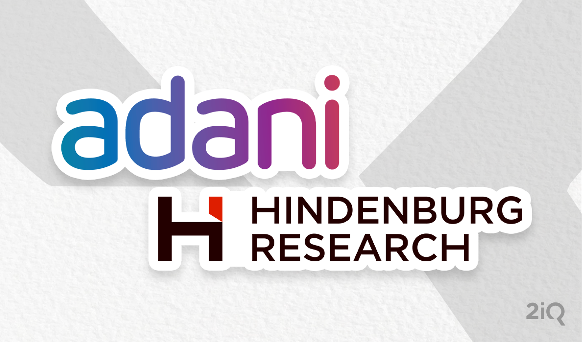 The image shown the logos of Adani and Hindenburg Research against the grey background.