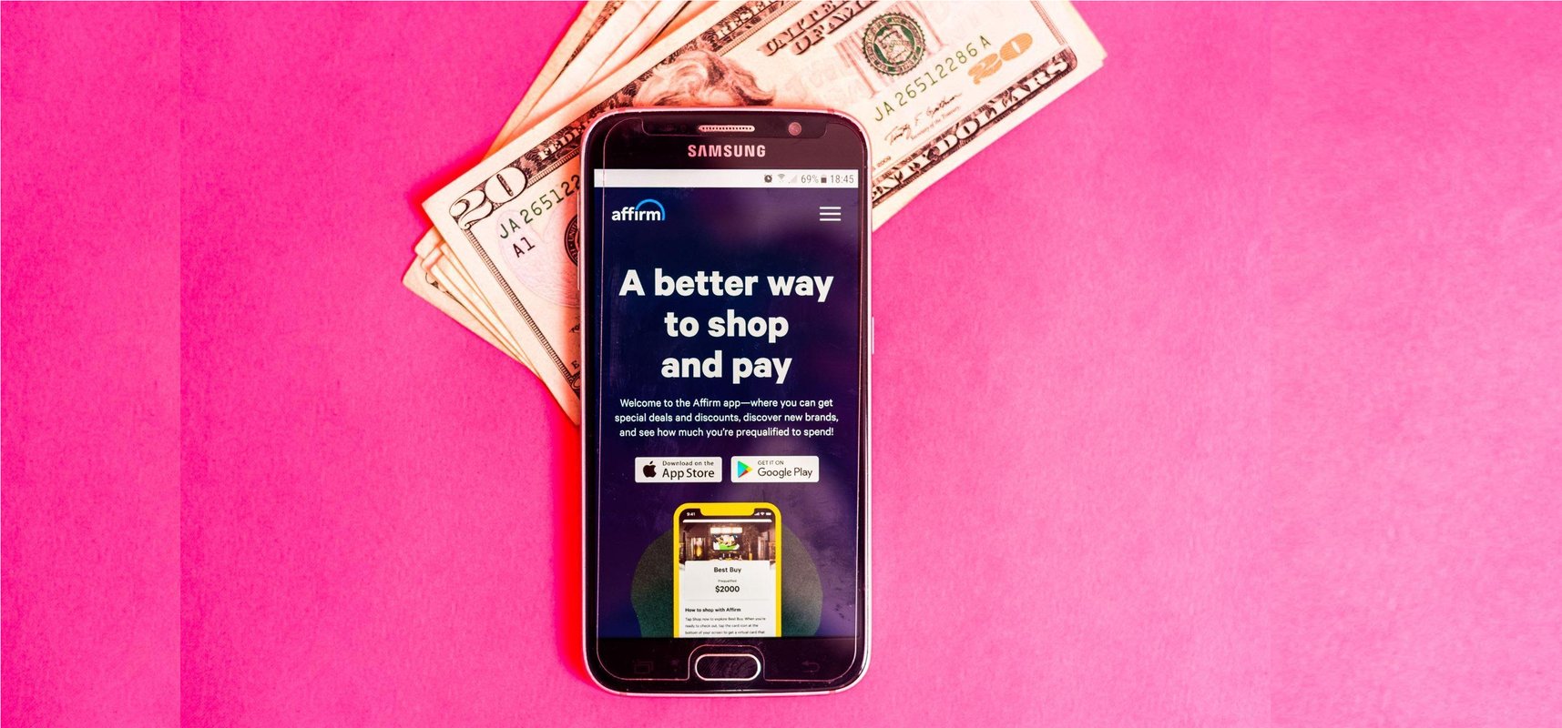 A few notes are placed on a pink background with a mobile phone displaying the Affirm Holdings Inc. app.